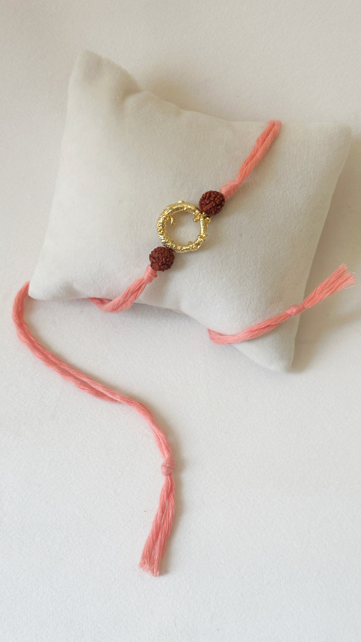 Mudra Rakhi Gold Rudraksh Pink Thread