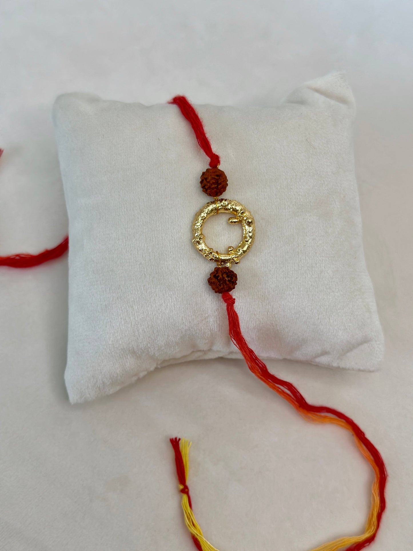 Mudra Rakhi Gold and Red