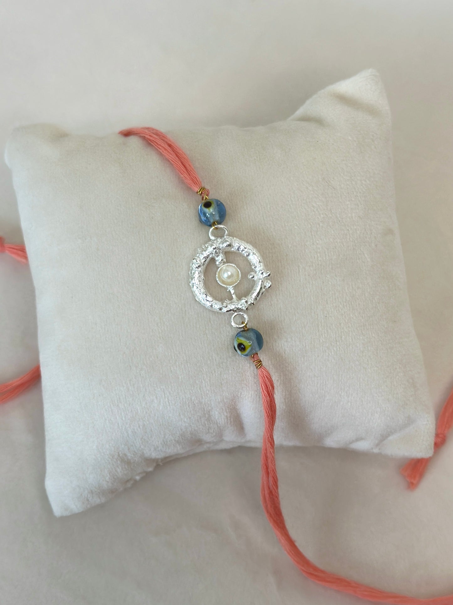Mudra Stone Rakhi Silver and Pink