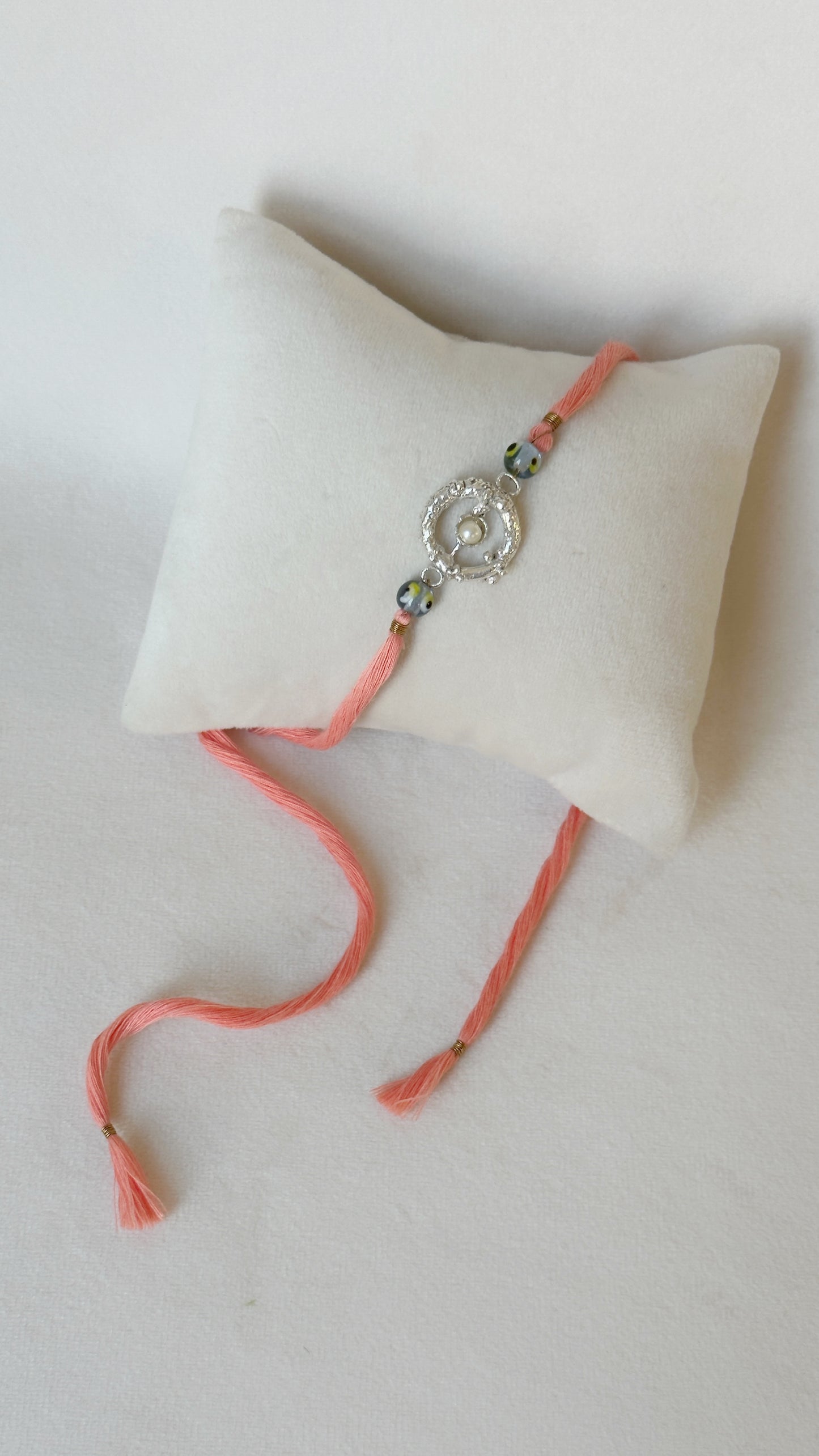 Mudra Stone Rakhi Silver and Pink