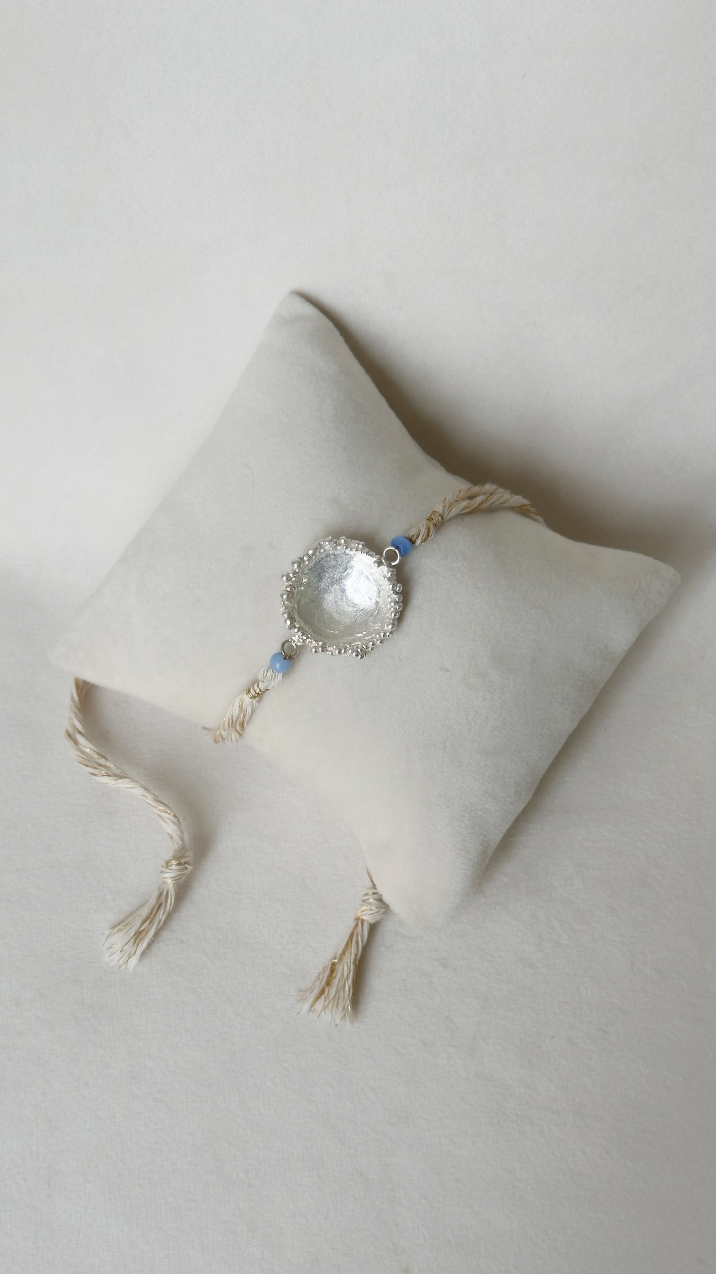 Surya Rakhi Silver and White