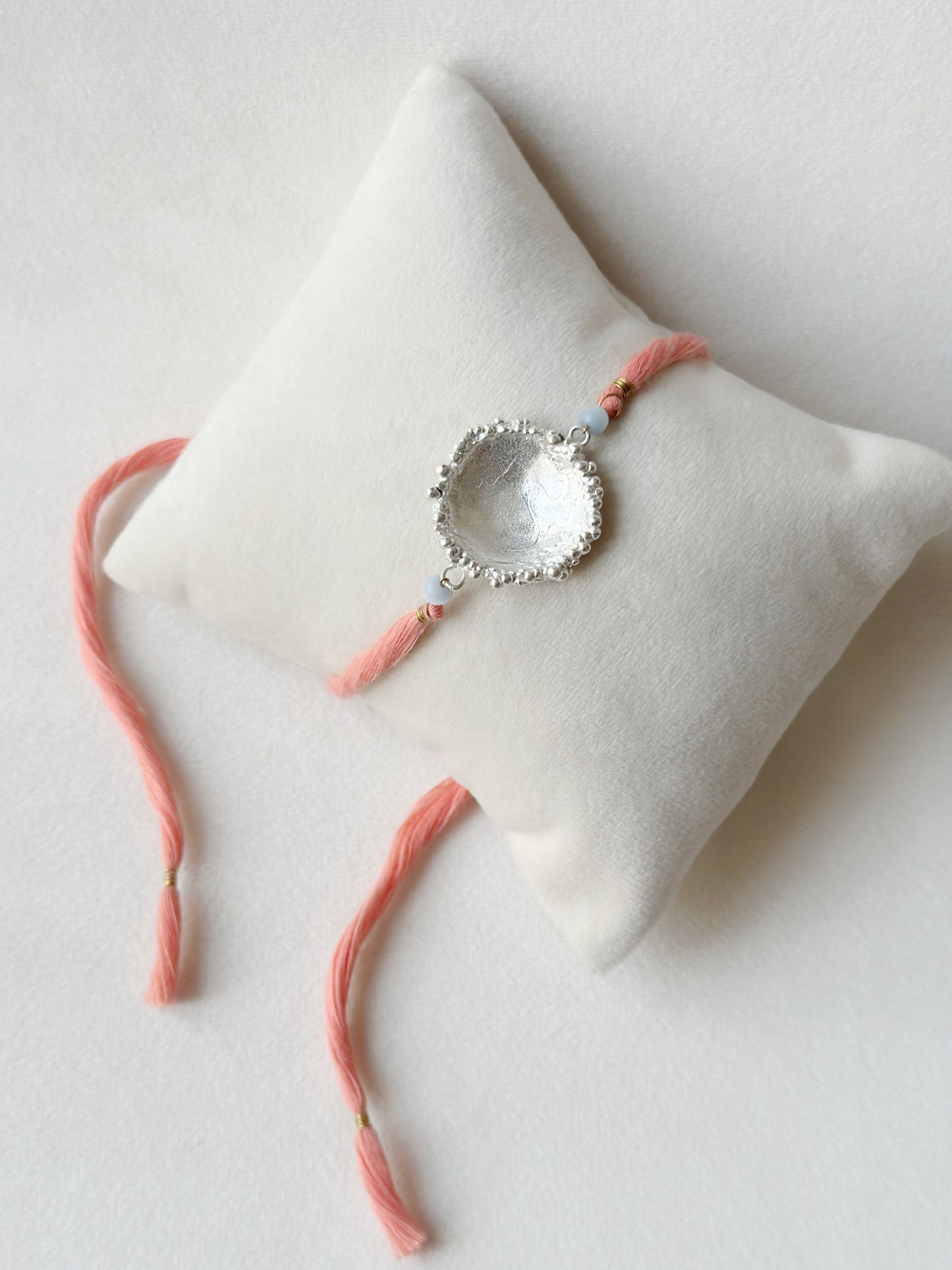 Surya Rakhi Silver and Pink