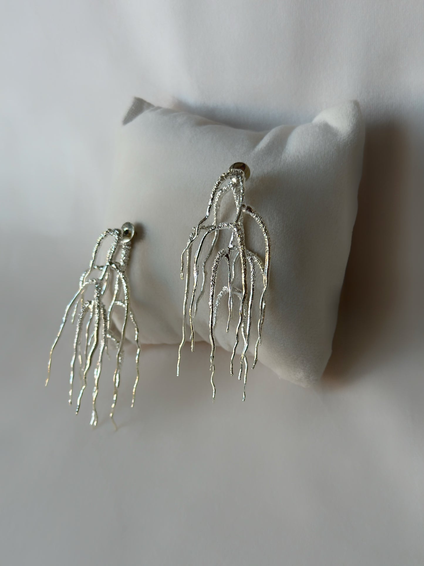 Untamed goddess dangles silver