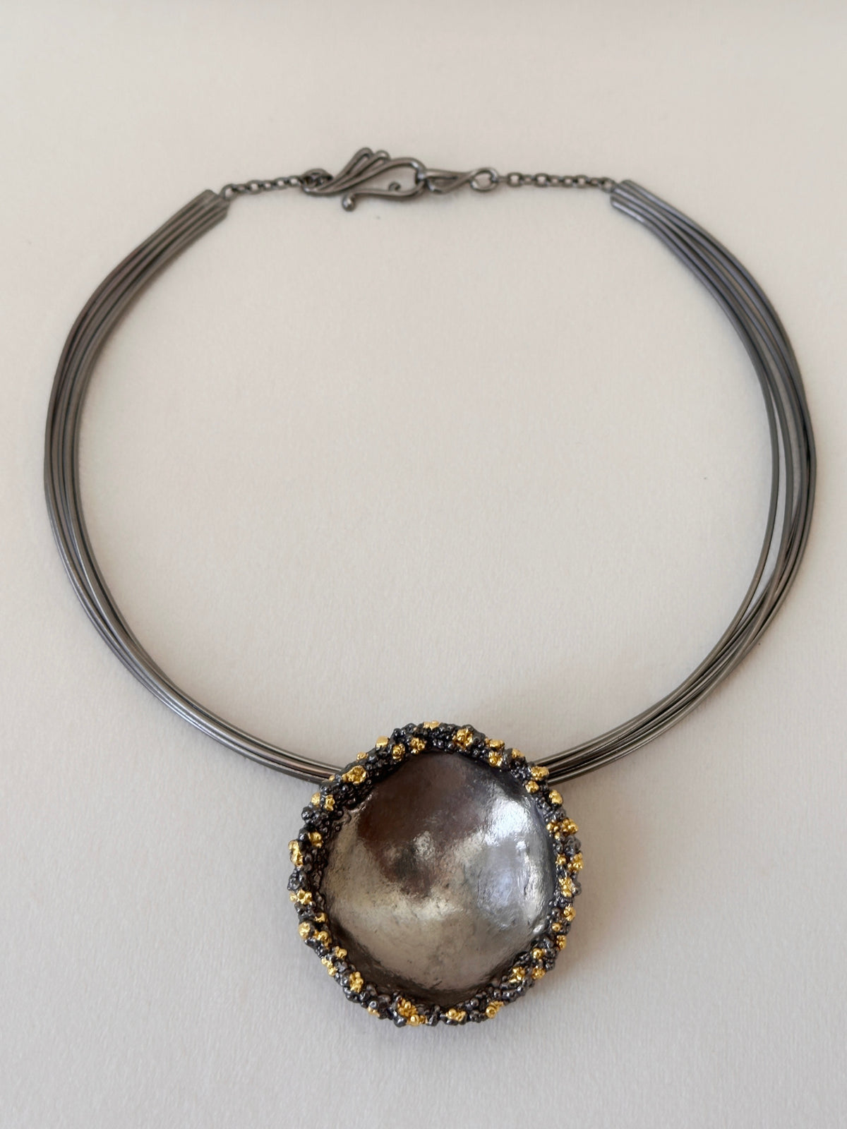 Crater Neckpiece Black and Gold