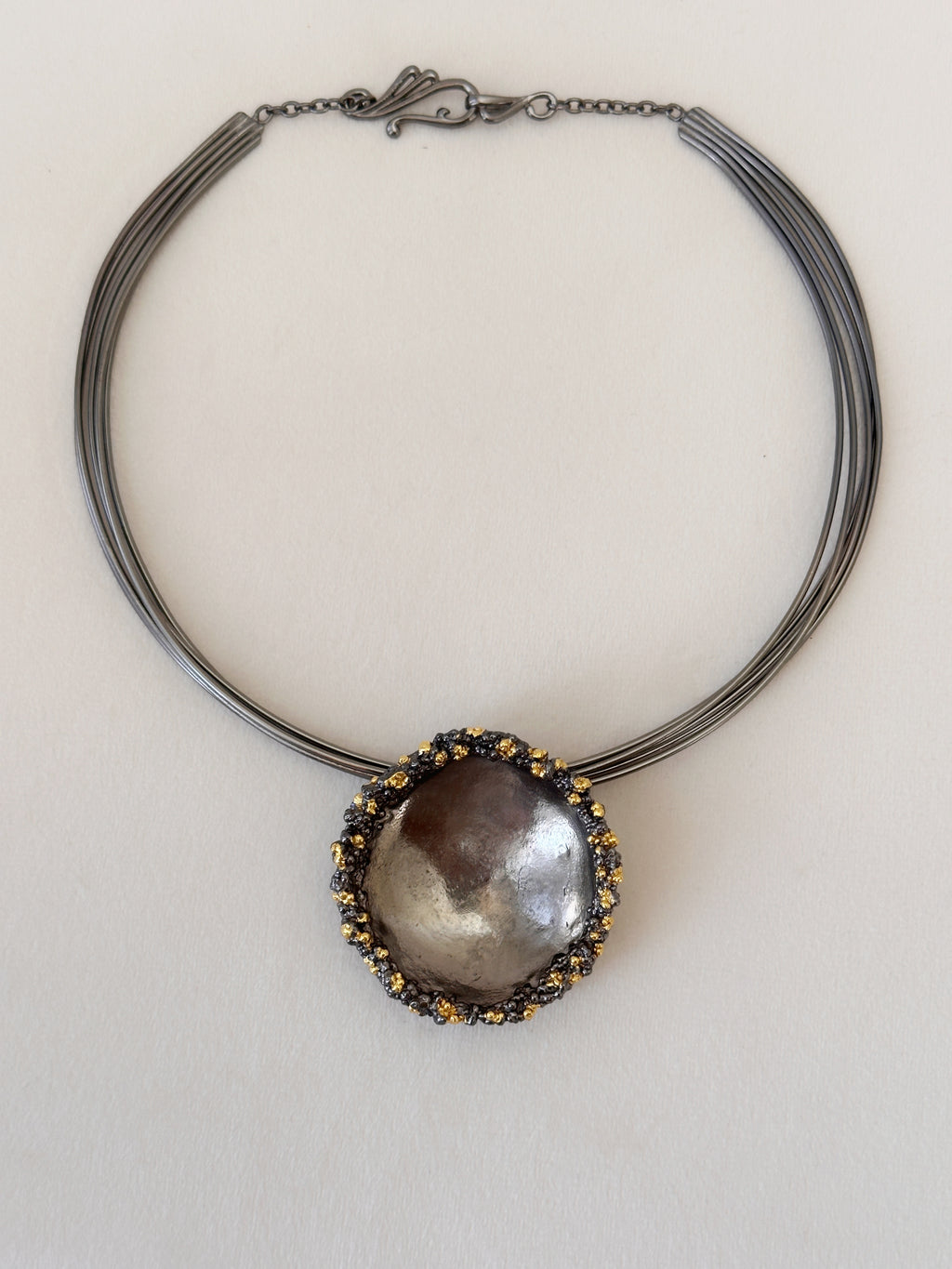 Crater Neckpiece Black and Gold
