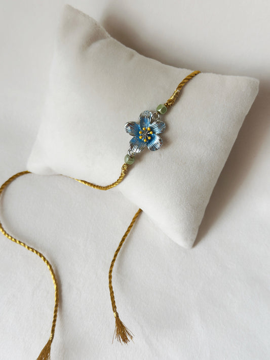 Floral Rakhi Small Silver, blue and gold