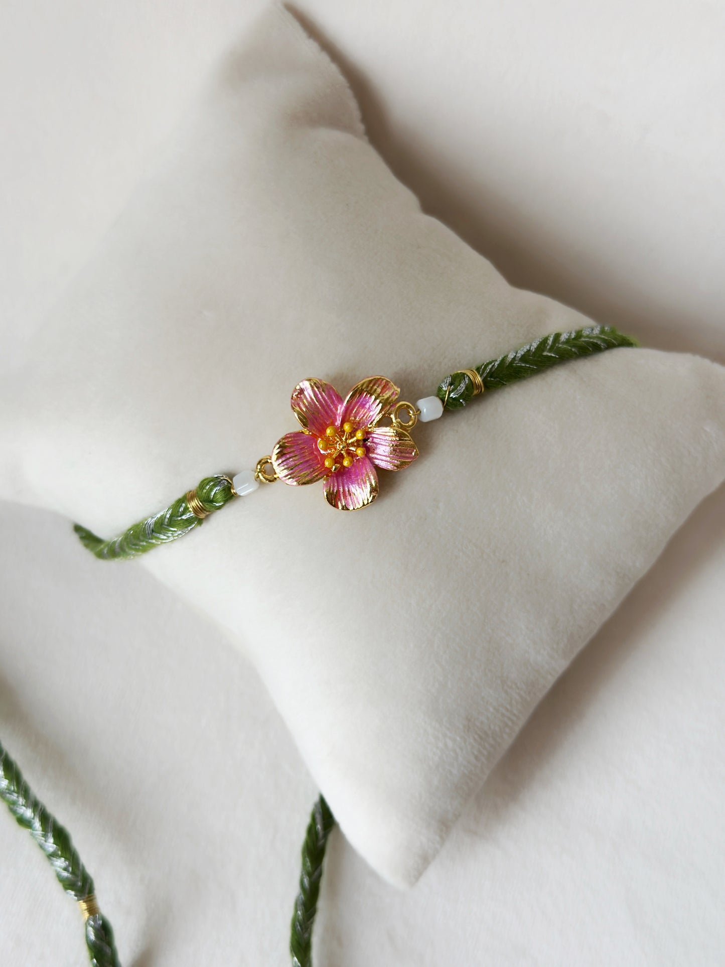 Floral Rakhi Small Gold, pink and green