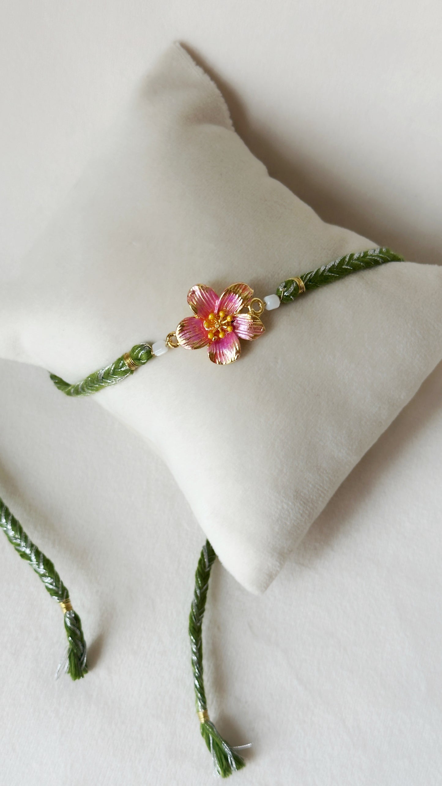Floral Rakhi Small Gold, pink and green