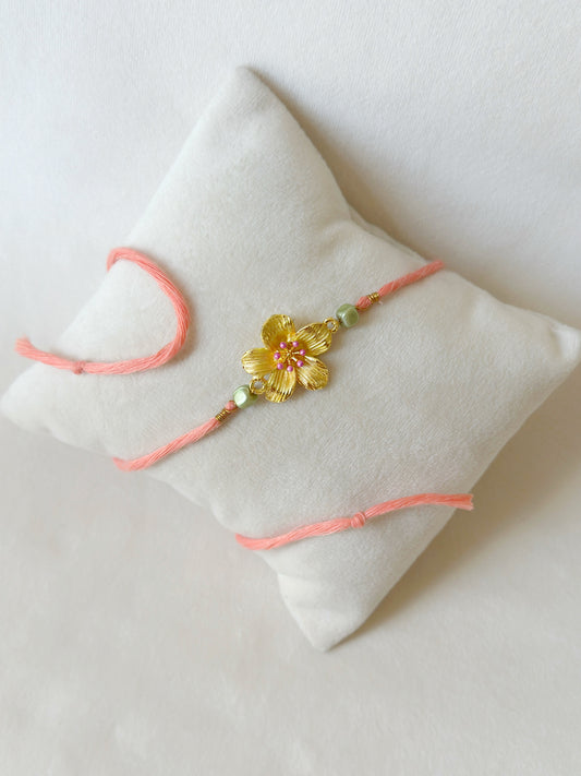 Floral Rakhi Small Gold, green and pink