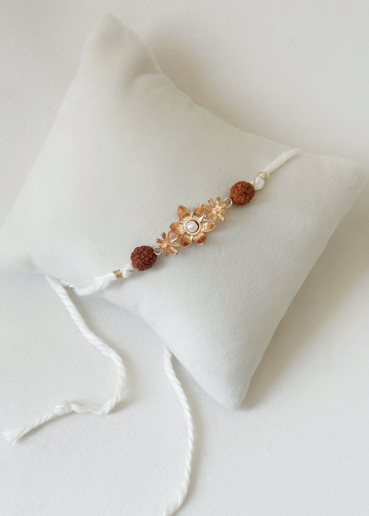 Blooming Rakhi Rose Gold and White