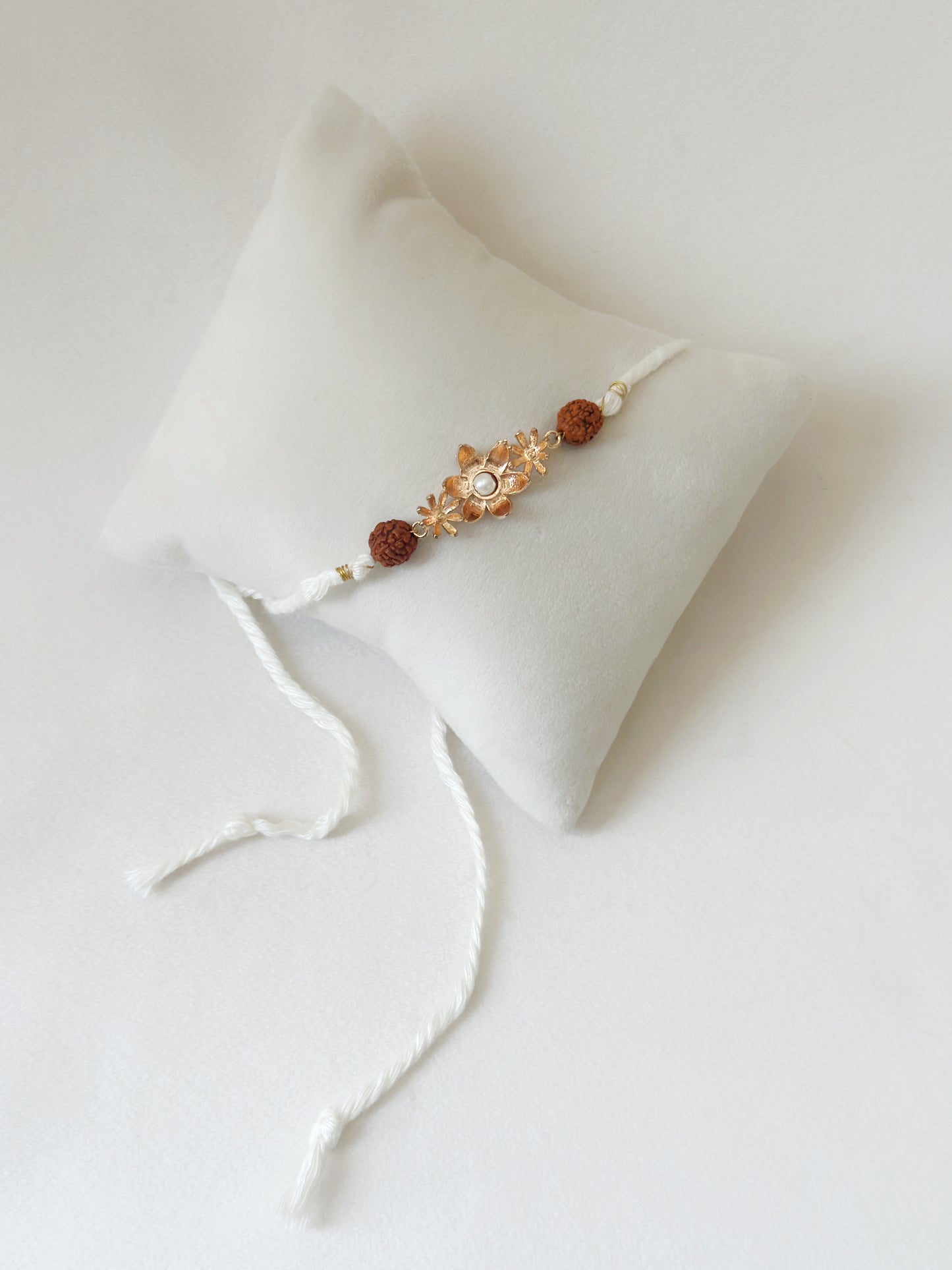 Blooming Rakhi Rose Gold and White