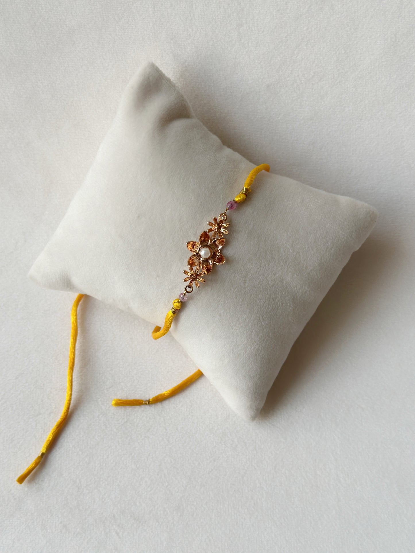 Blooming Rakhi Rose Gold and Saffron