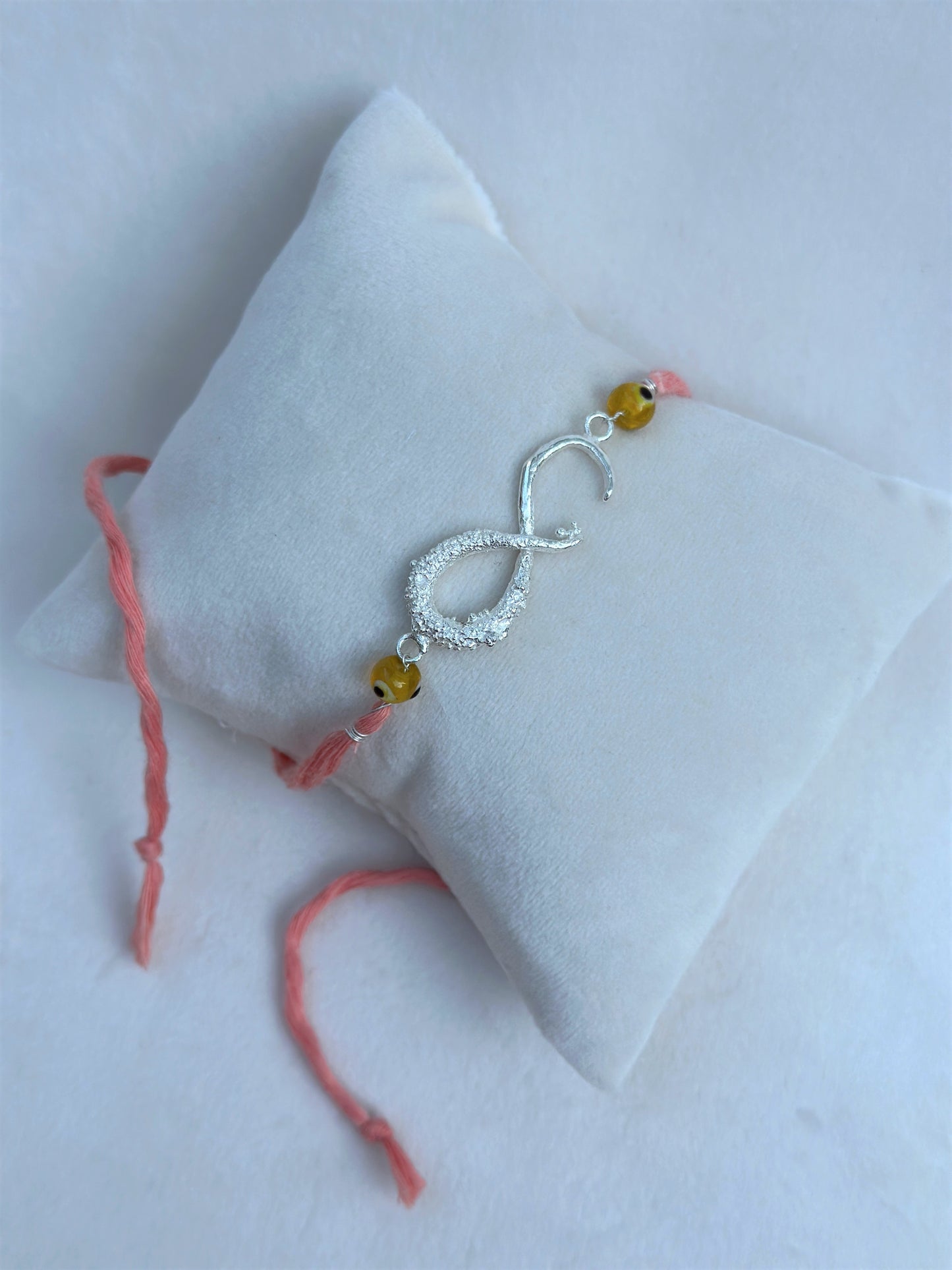 Infinity Rakhi Silver and Pink