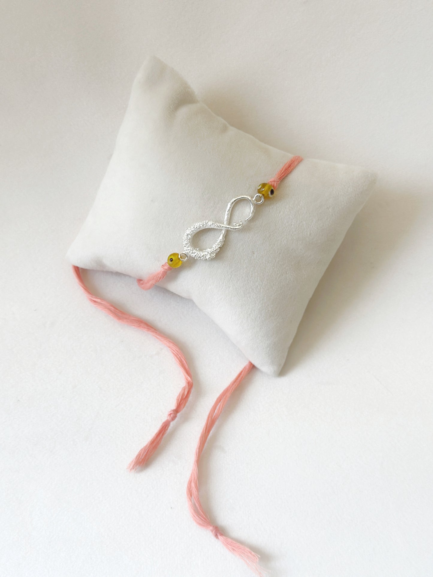 Infinity Rakhi Silver and Pink