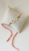 Infinity Rakhi Silver and Pink