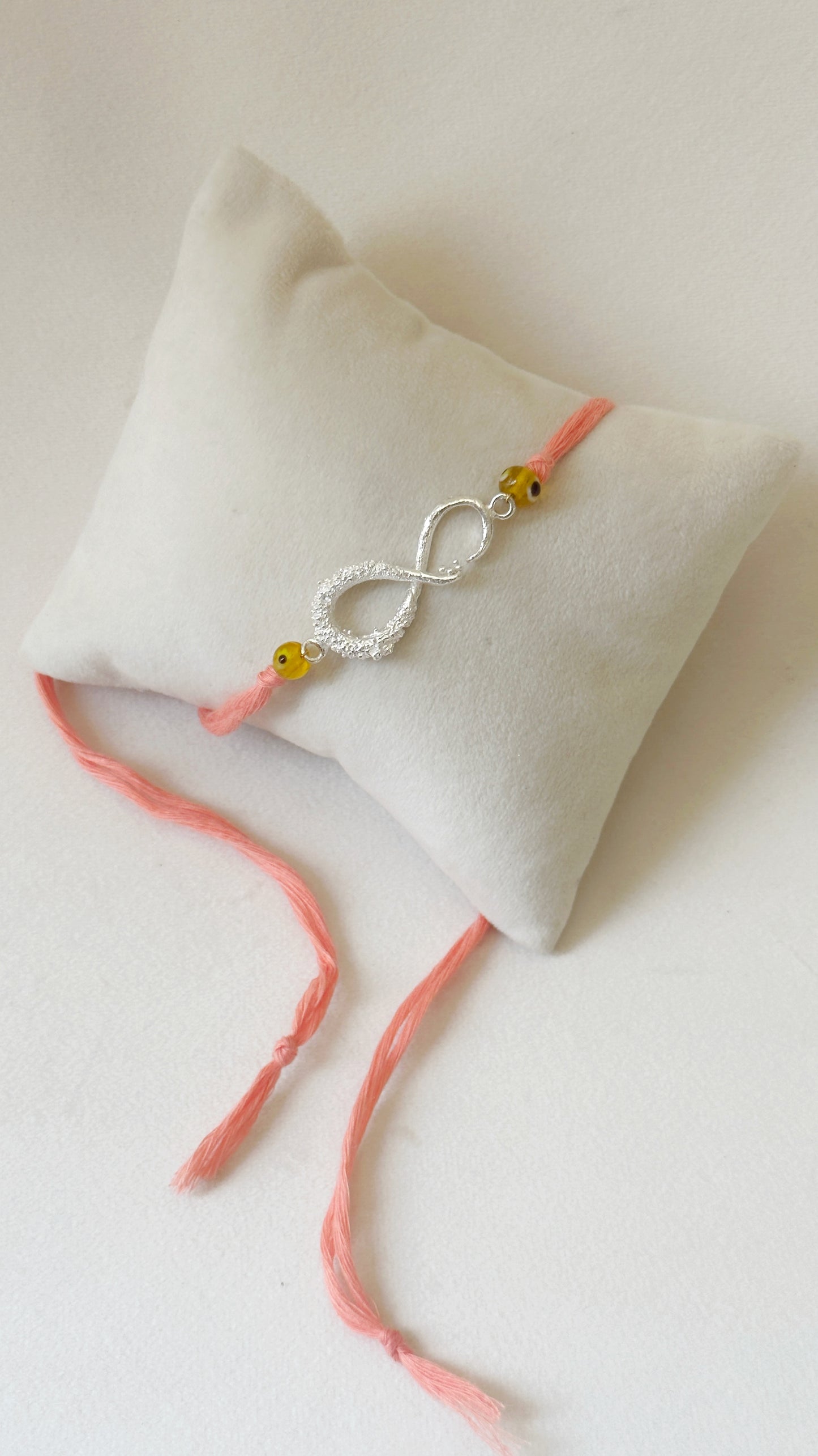 Infinity Rakhi Silver and Pink