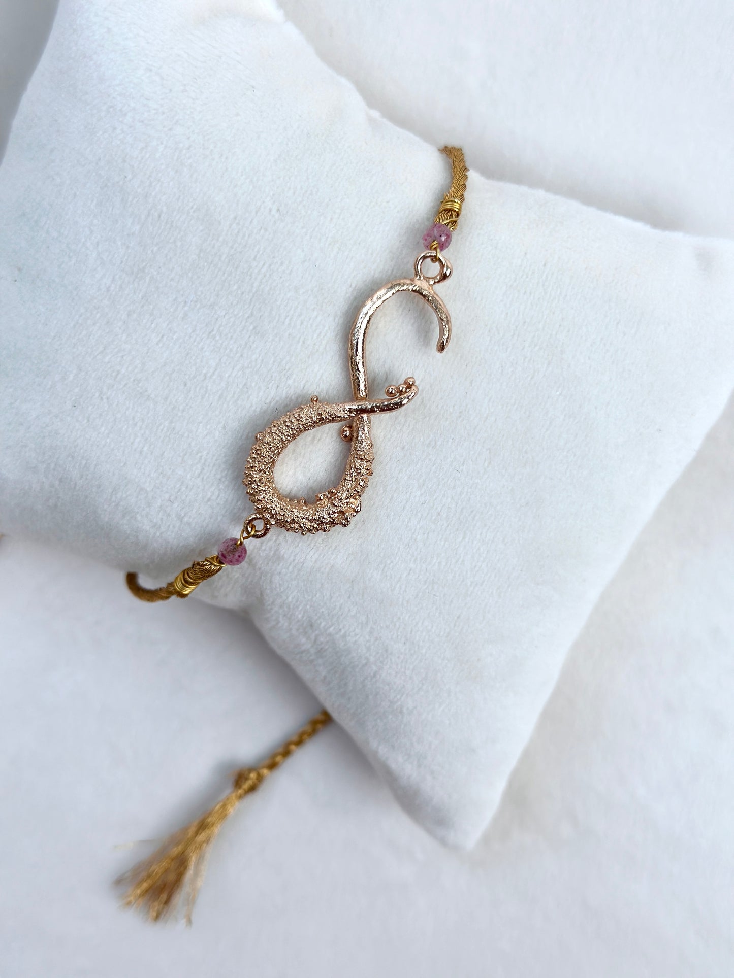 Infinity Rakhi Rose and Gold