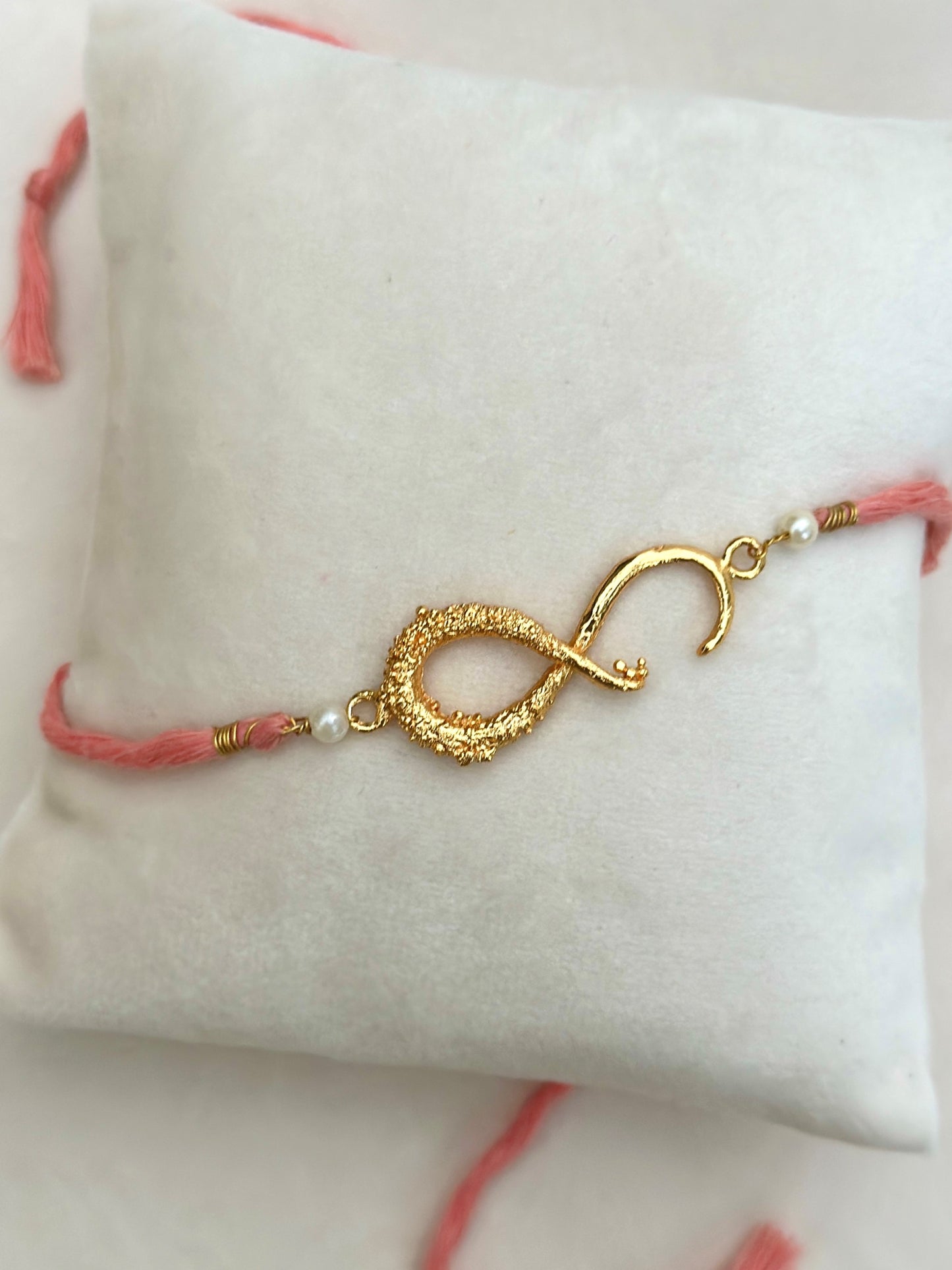 Infinity Rakhi Gold and Pink