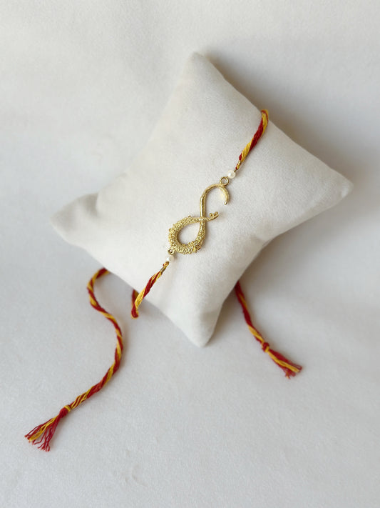 Infinity Rakhi Gold and Red