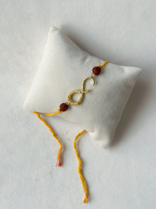 Infinity Rakhi Gold and Saffron with Rudraksh beads