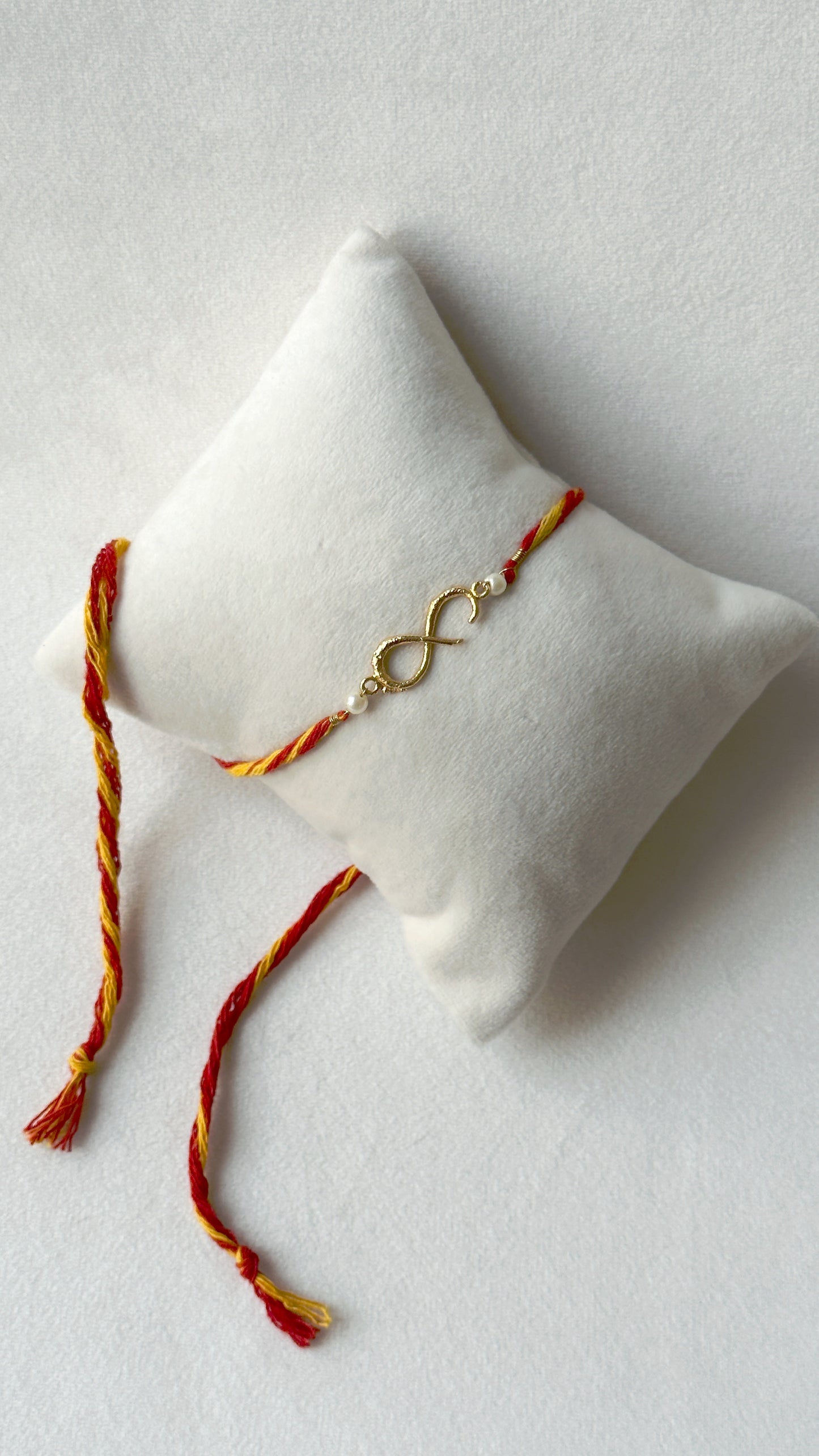Small Infinity Rakhi Gold and Red