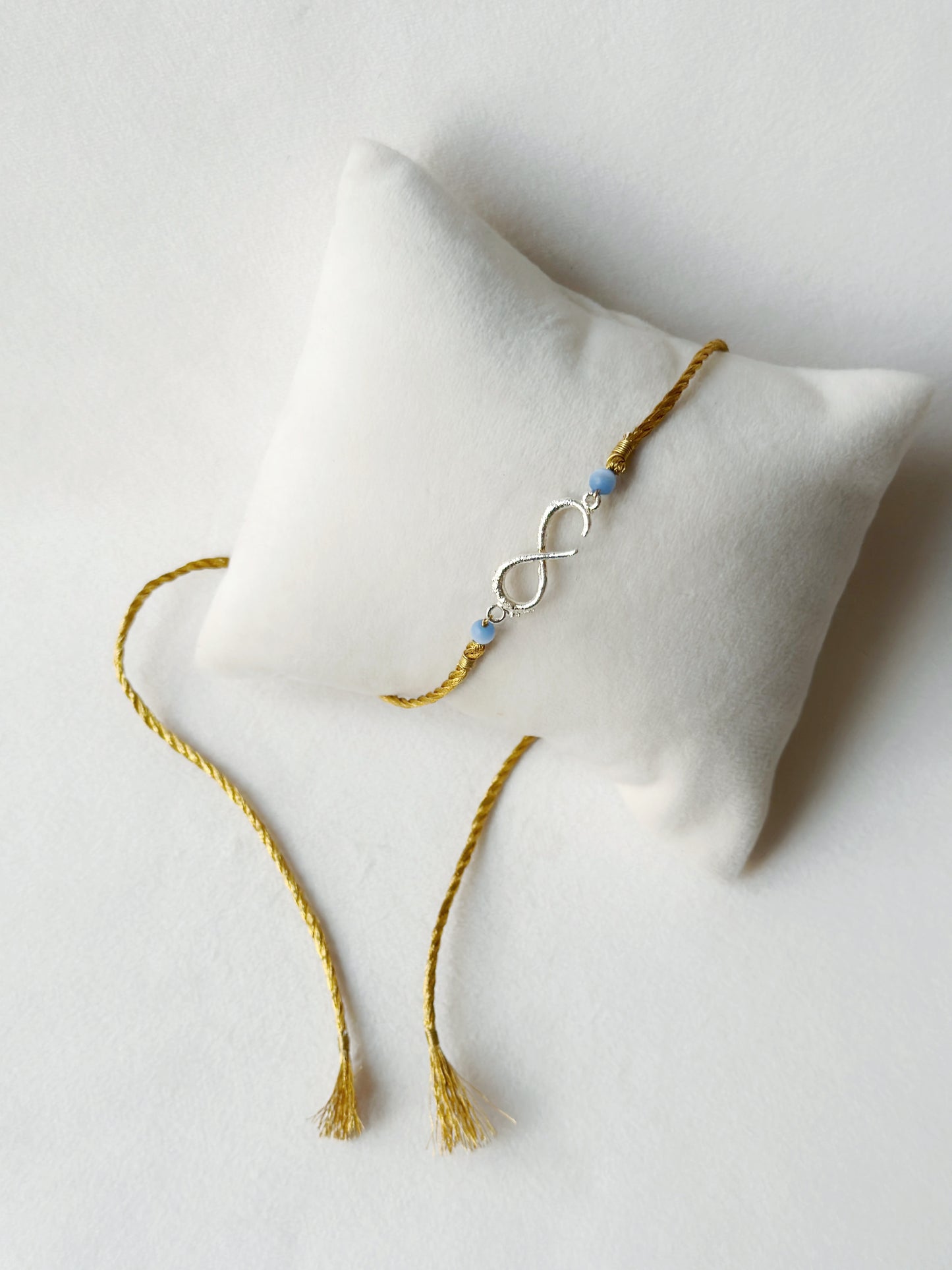 Small Infinity Rakhi Silver and Gold