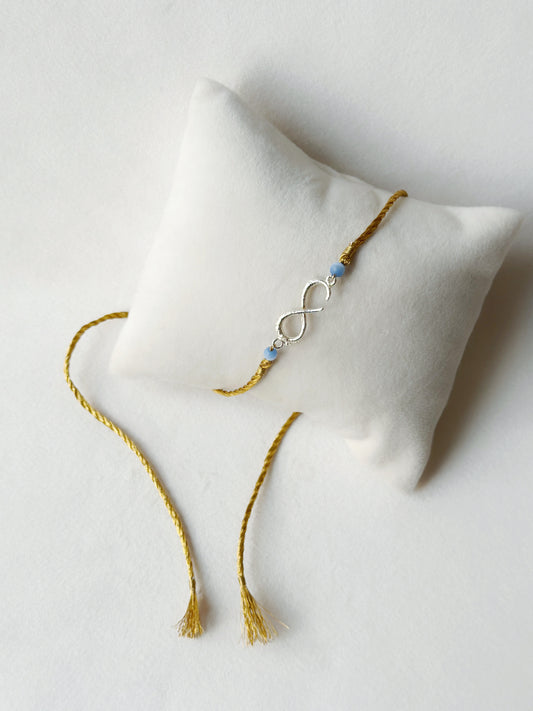 Small Infinity Rakhi Silver and Gold