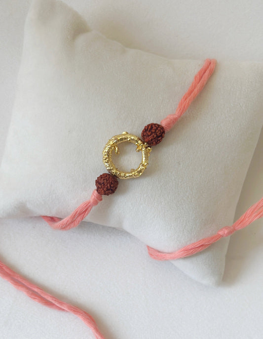 Mudra Rakhi Gold Rudraksh Pink Thread