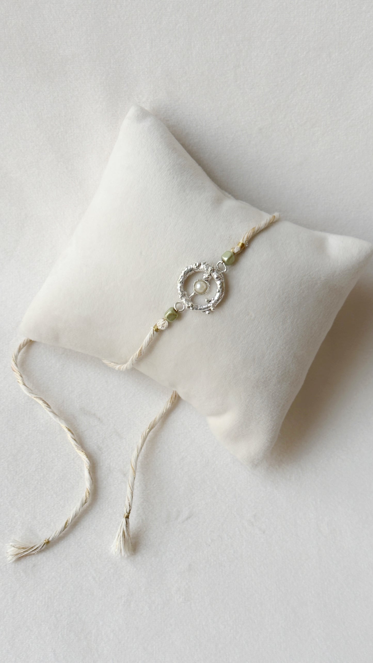 Mudra Stone Rakhi Silver and White