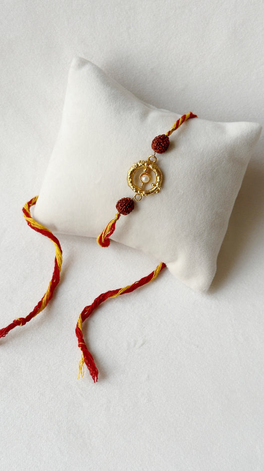 Mudra Stone Rakhi Gold and Red Rudraksh