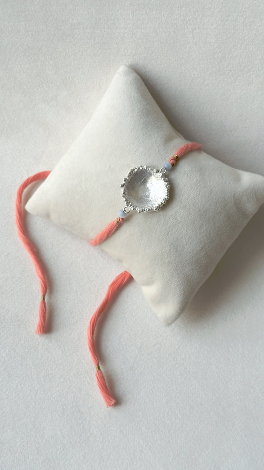 Surya Rakhi Silver and Pink