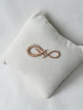 Infinity Brooch Rose Gold