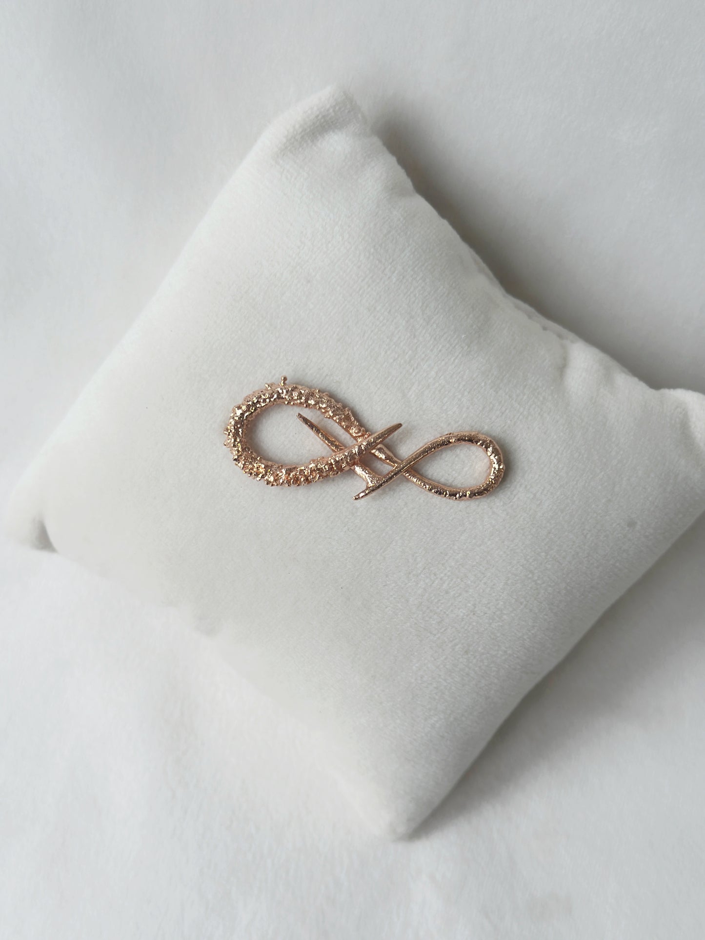 Infinity Brooch Rose Gold