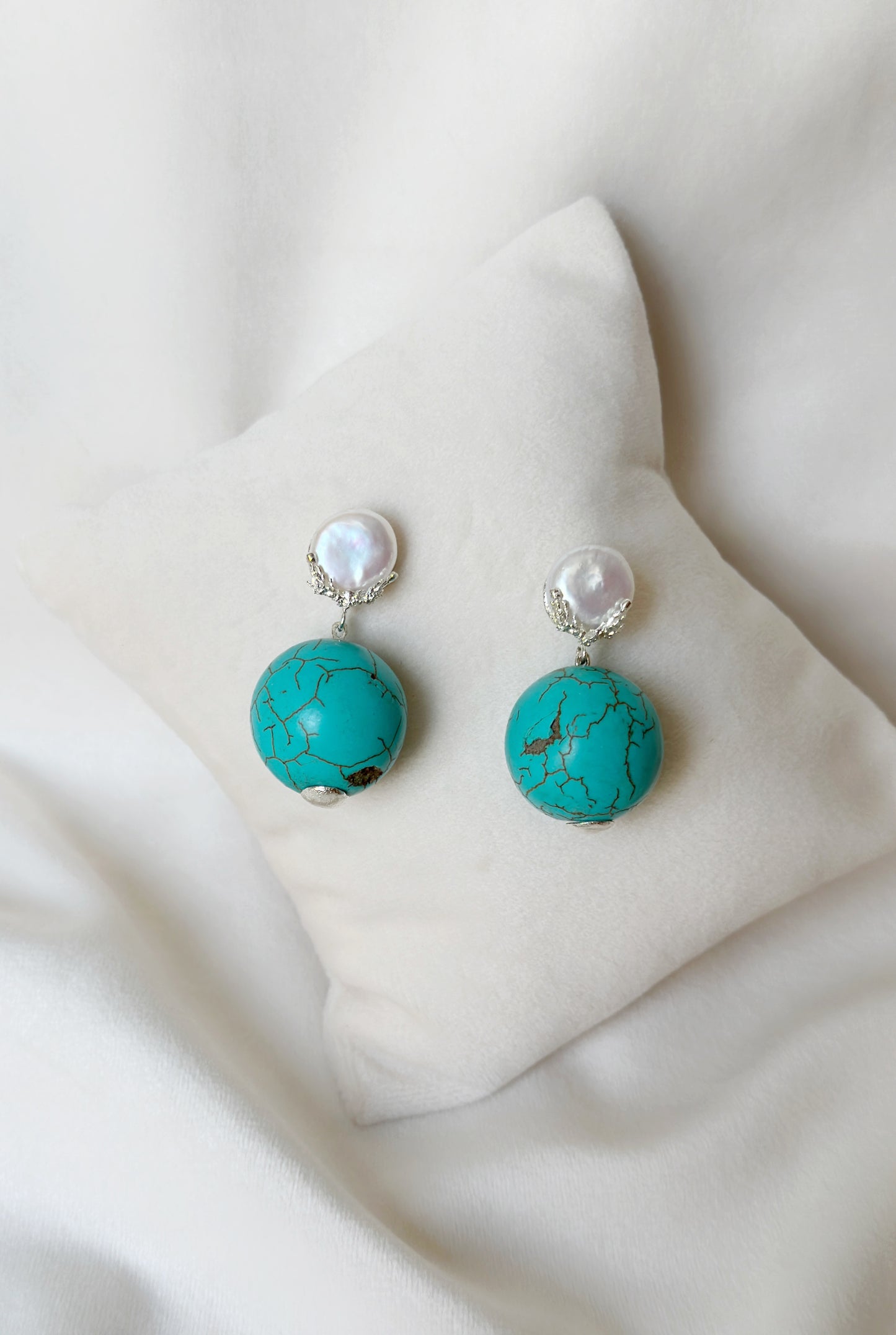 Pearl Globe Swings