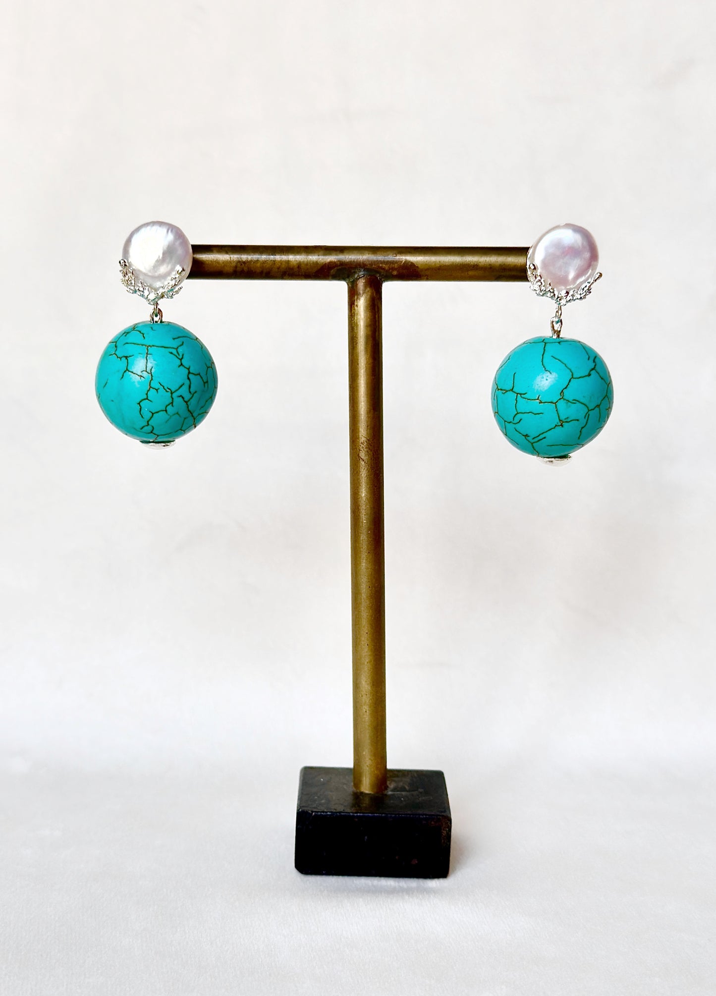 Pearl Globe Swings