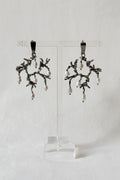 Untamed pearl drops chandelier earrings black