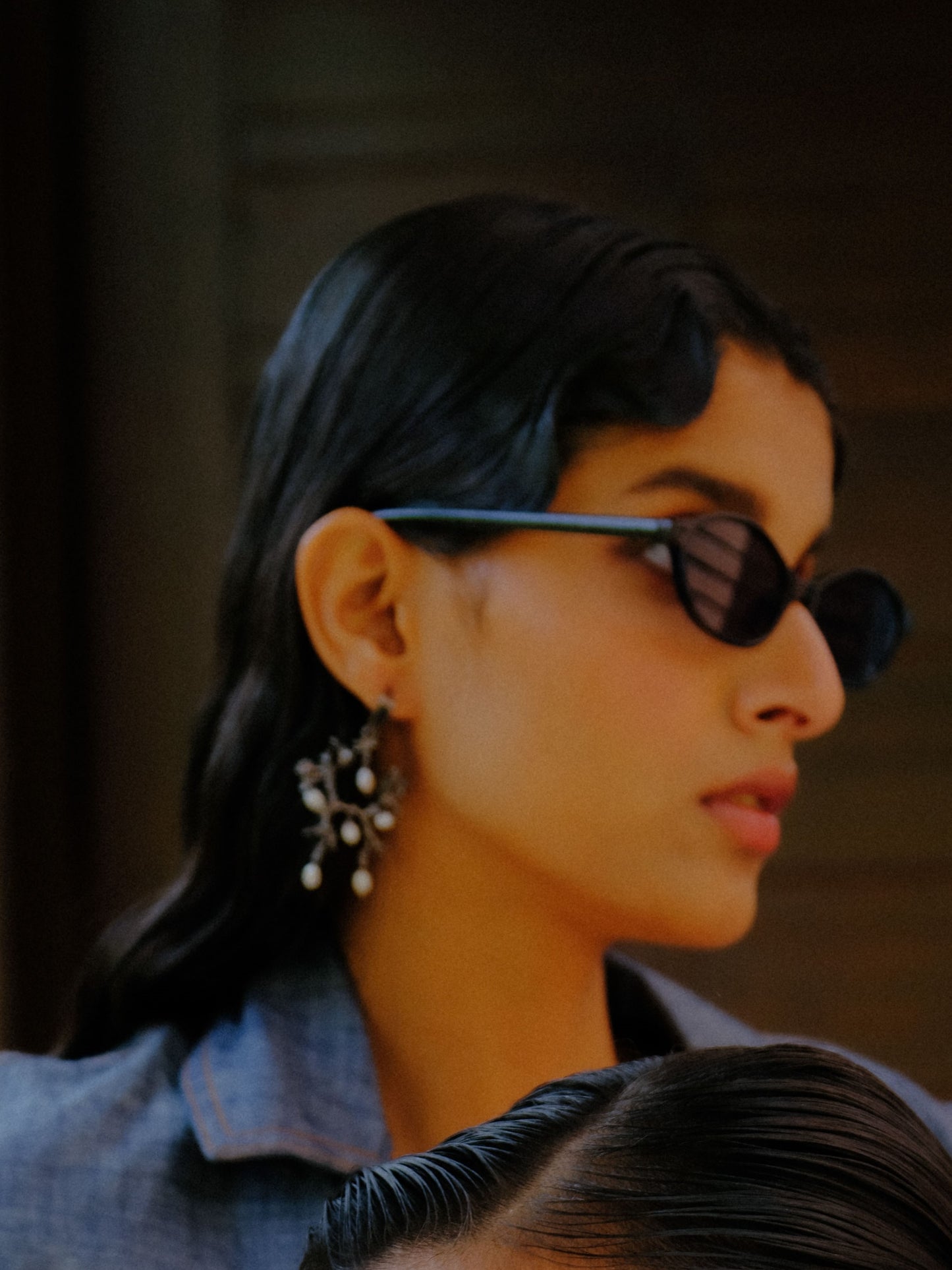 Untamed pearl drops chandelier earrings black